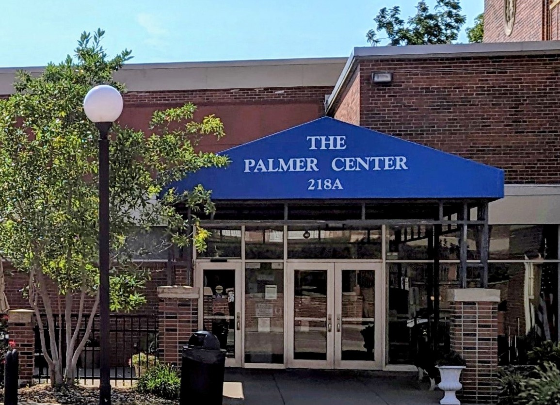 A picture of the front entrance to the Palmer Center 