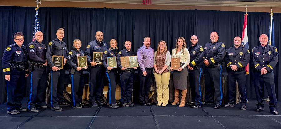 Independence Police Officers holding their Awards for Valor at the 53rd Annual Metropolitan Chiefs and Sheriffs Associations ceremony