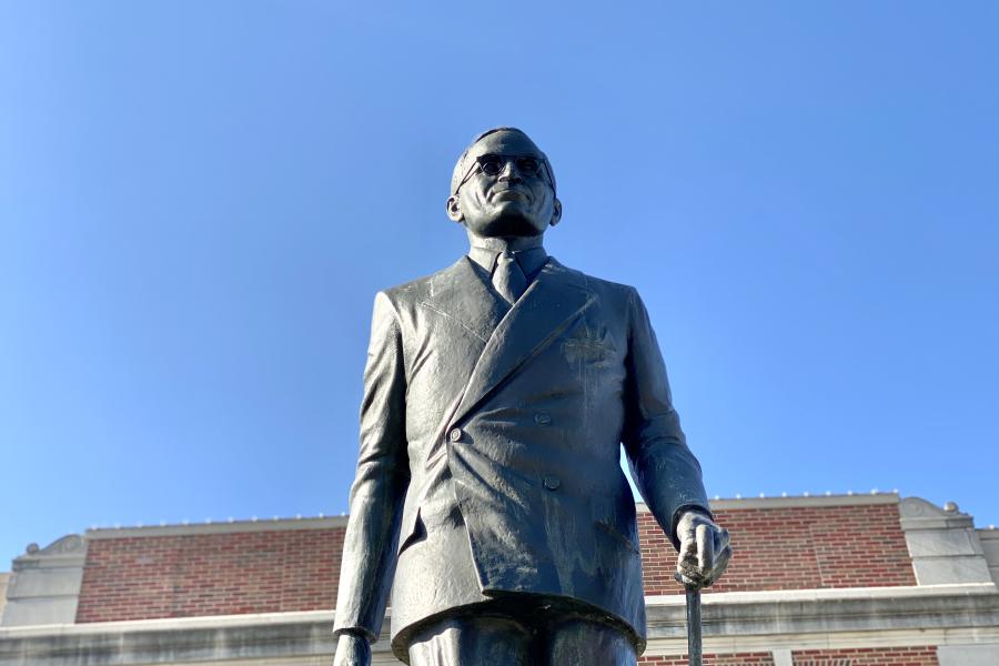 Looking up at the statue of President Truman walking with his cane on the east side of the Historic Truman Courthouse in Independence, Mo.