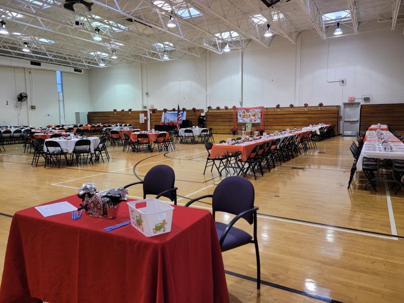 Tables and Chairs set up for an event in the Palmer Center Gymnasium 