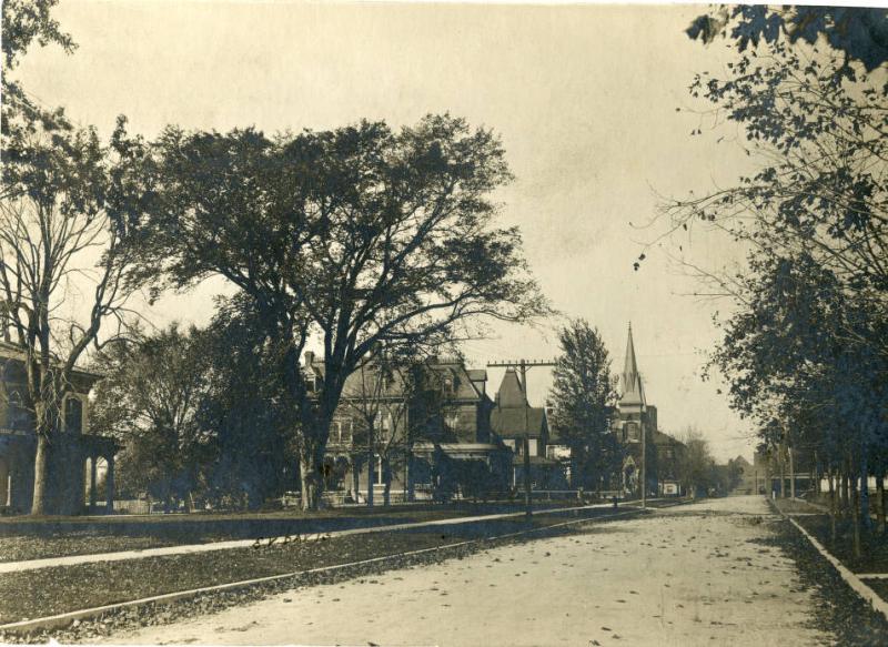 A historic, black and white image of Pleasant Street in  Independence. Date unknown. 